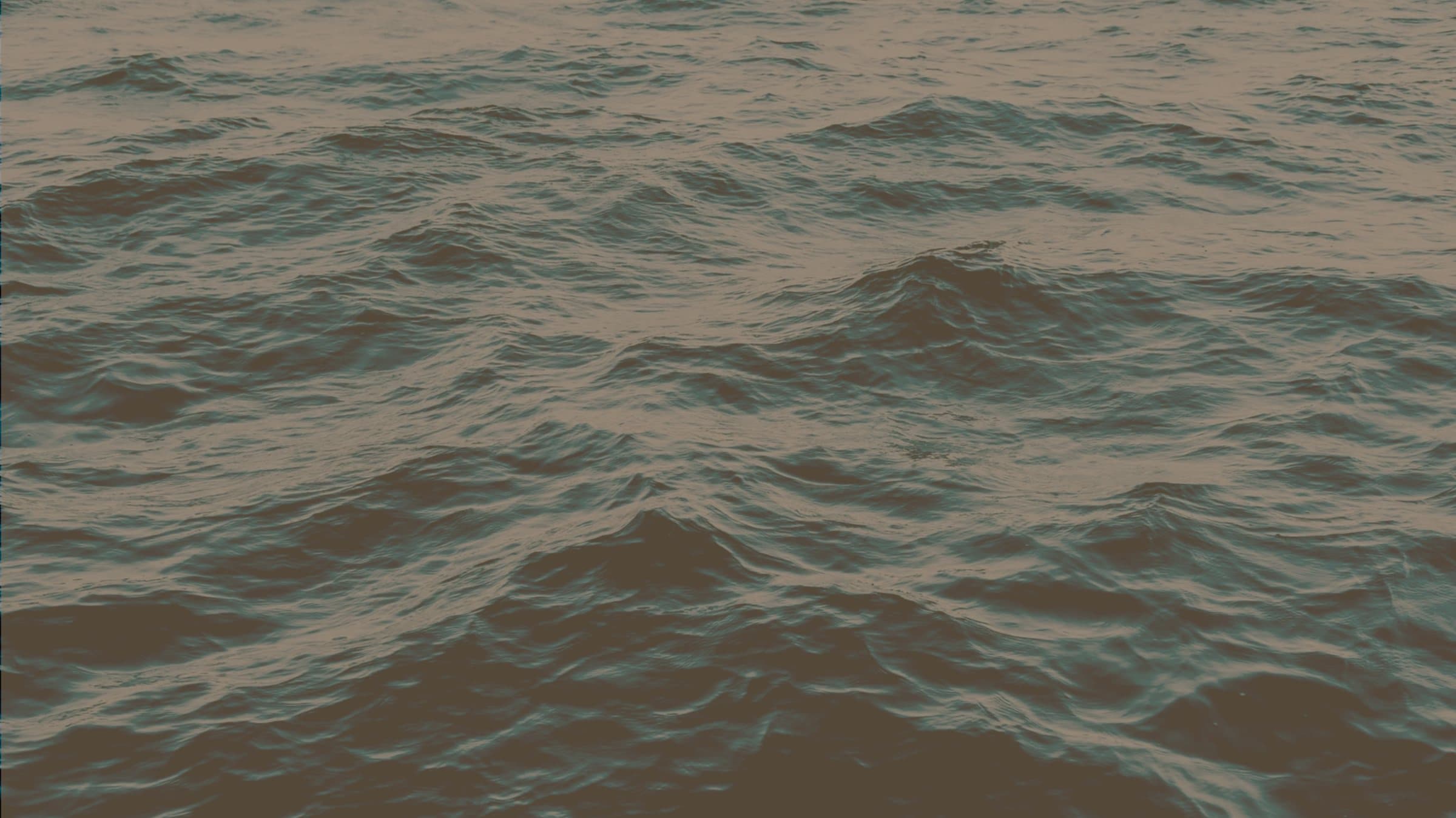 Late afternoon light on the open sea
